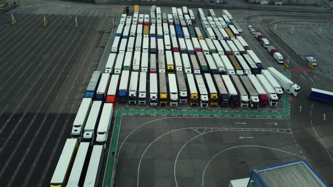 Trucks Parked in a Large Parking Lot