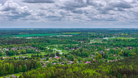 countryside town in green dense nature landscape. timelapse