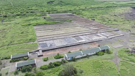 Drone-view-above-the-salt-settling-basin-at-Pointe-au-Sel-in-Saint-Leu,-Reunion-Island,-with-low-altitude-forward-movement