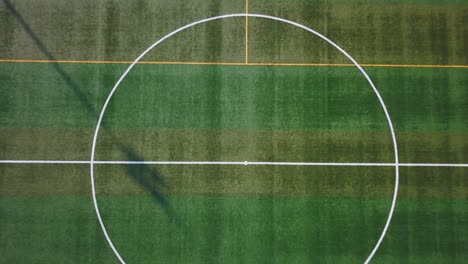 aerial of football pitch with artificial green turf