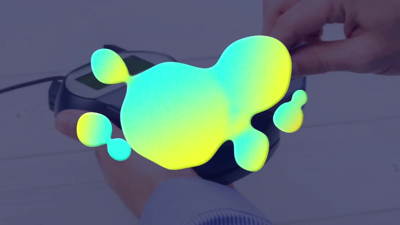 Animation of colorful stain over payment terminal