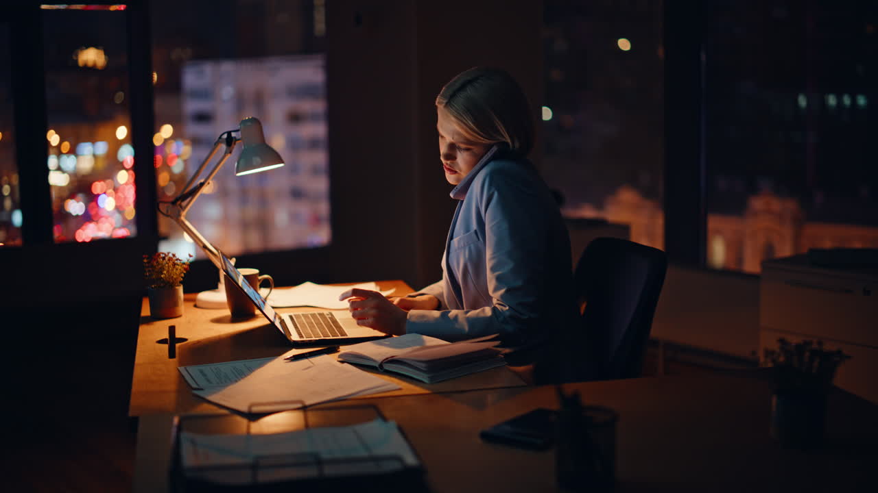 Busy manager night call workplace texting laptop closeup. Businesswoman talking