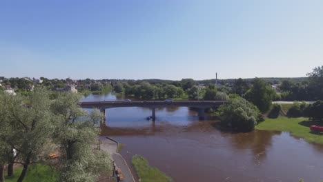 Wooden-Walkway-Surrounded-by-Flooded-River-Water