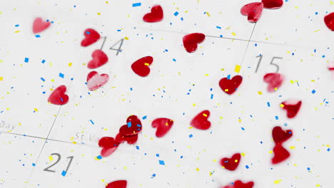 animation of confetti and red hearts on calendar on white background