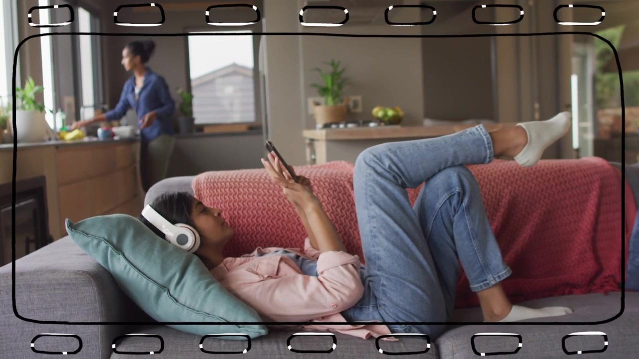 Teen girl tapping phone and listening on headset for lifestyle rest while parent prepping snack