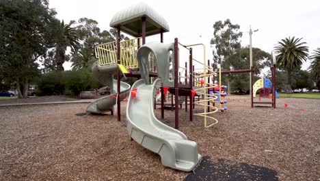 4K-wide-shot-of-roped-off-playground-during-pandemic-lockdown