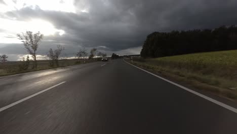 drive on german highway from the car's point of view with rainy clouds, 4k