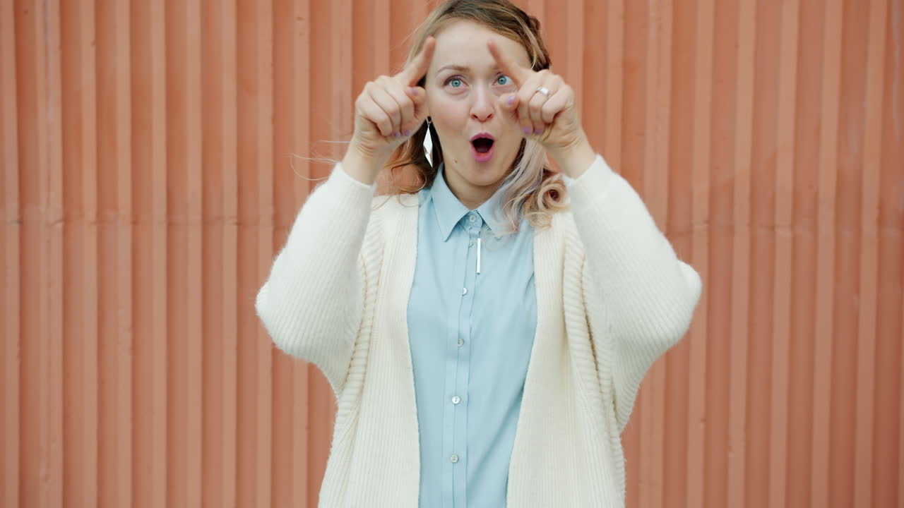Woman Expressing Surprise and Excitement