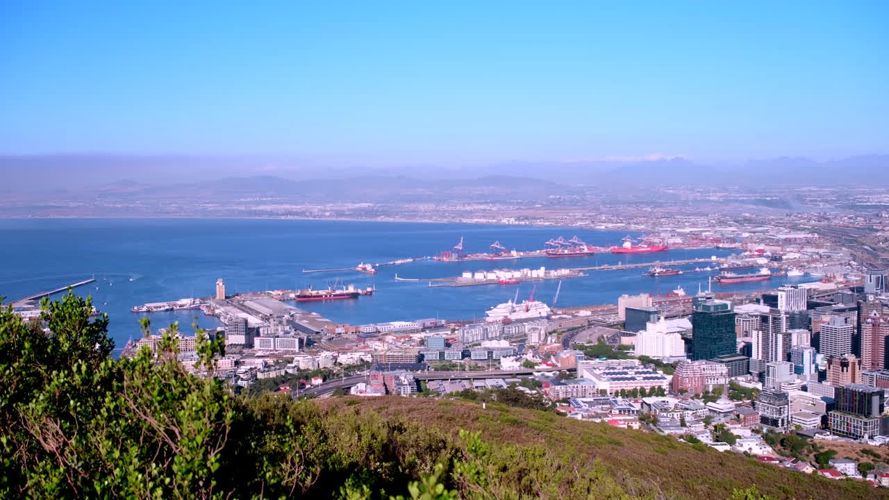 High angle view over Port of Cape Town from Signal Hill drive, reveal shot