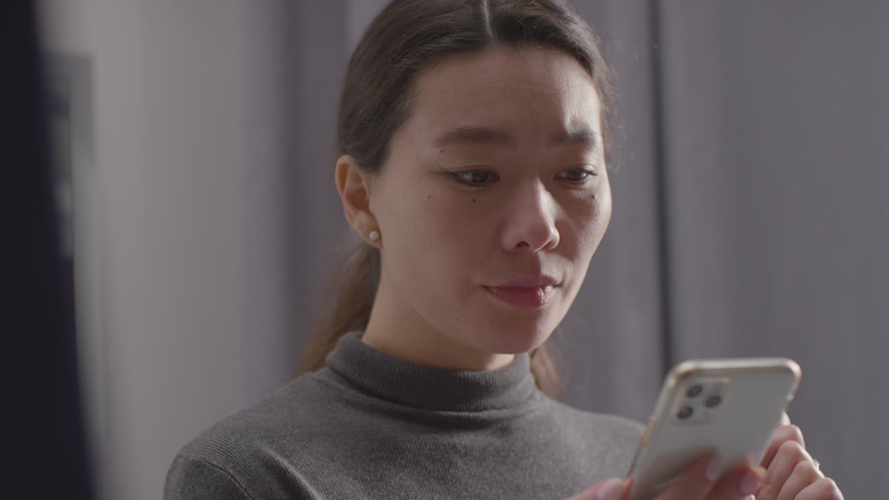 Disappointed Woman At Home Receiving Text Message Telling Her She Has Been Unsuccessful In Job Interview 2