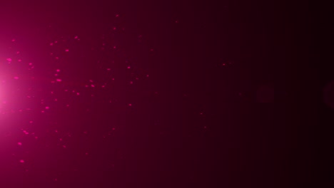 animación muy detallada de chispas rosadas producidas por un emisor fuera de pantalla.