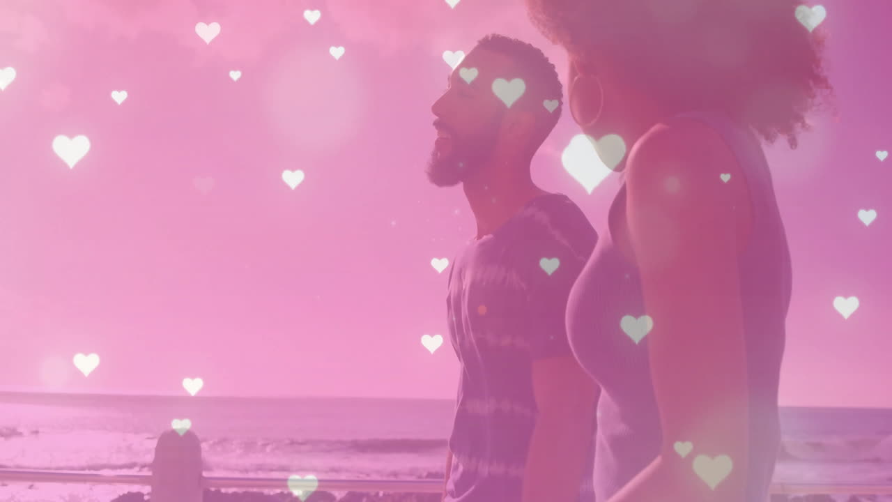 바가에서 고 있는 두 인종의 부부에게 떨어지는 마음의 애니메이션