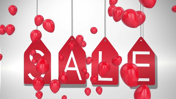 Grafica saldi su etichette rosse con palloncini su sfondo bianco