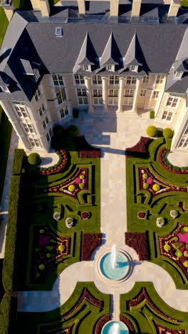 luxury mansion with formal gardens