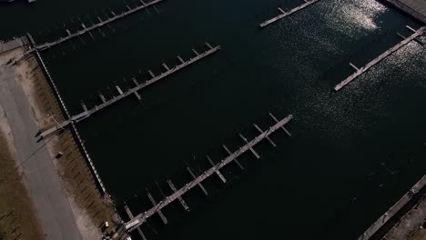 an aerial view over an empty marina in freeport, ny on a sunny day