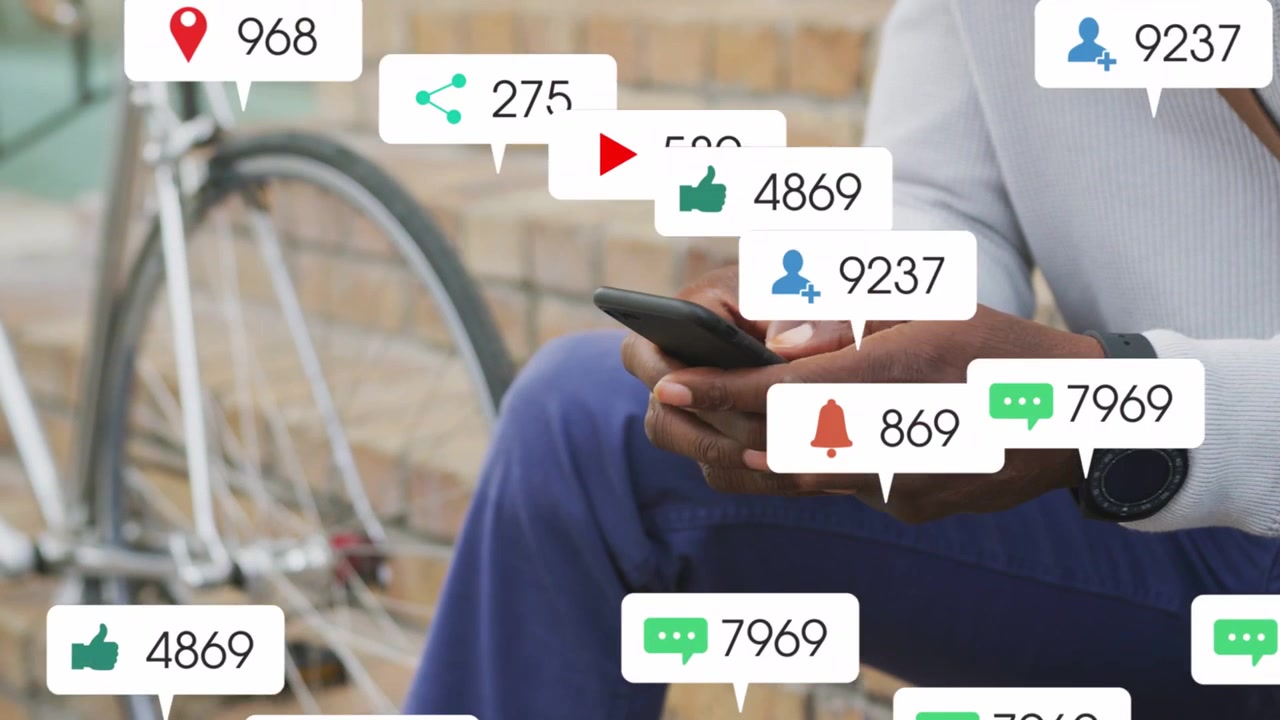 Mature man sitting on steps tapping phone, social alerts piling, covering view, checking engagement
