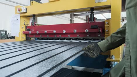 metal sheet forming machine at the modern metalwork factory.