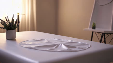 white silk tablecloth on a table