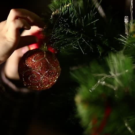 kid decorate christmas tree