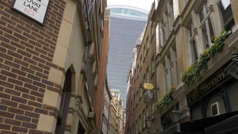 view of london city skyscraper through old architecture buildings