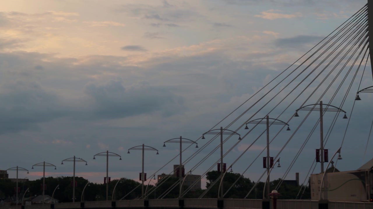 Static shot of Provencher bridge in Winnipeg during sunrise.