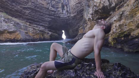 muscular and fit young man on vacation at sea.