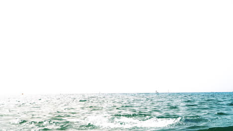 professional black football player doing an aqua workout in the sea of barcelona