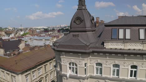 aerial view of a european city with a bride looking out of a window