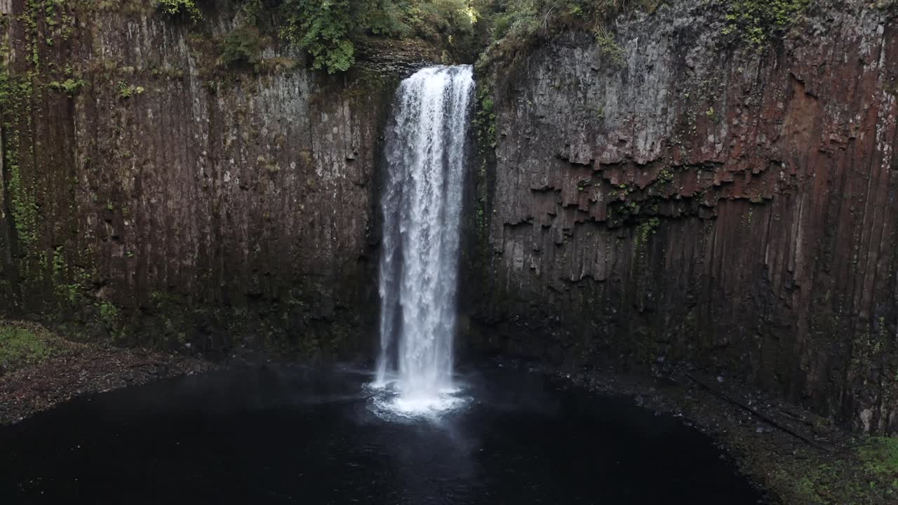 Majestic Waterfall Cascading Down a Cliff Face