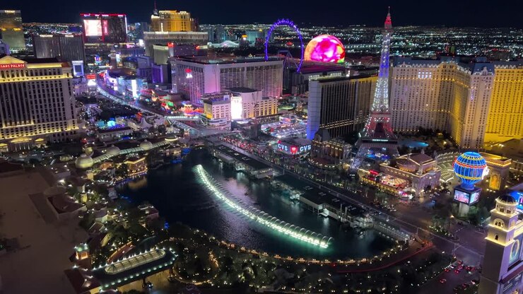 Las Vegas Strip at night with the Bellagio fountain and sphere