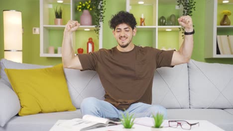 Young-man-delighted-with-the-news-he-saw-on-the-phone.