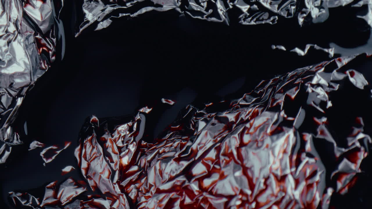 Crumpled Foil with Red Liquid