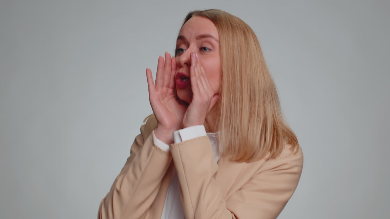 Business woman scream yell with hand near mouth greeting hello announces the news saleswoman