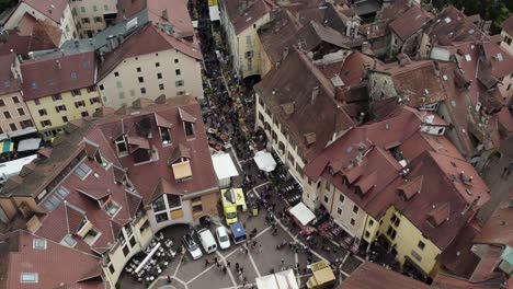 aerial drone view of crowded streets of annecy city, france