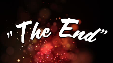 words the end are displayed on background with fairy lights