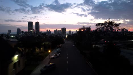 san diego sky line at sunset june 2 2021 orange and red sky 4k mavic air 2s palm trees. sunset was at 8:01pm and this clip was filming shortly after.