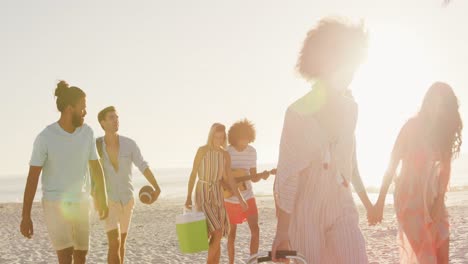 friends going to party on beach