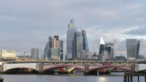 london skyscrapers next to the river thames