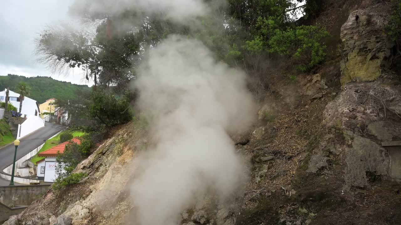 120 fps slow motiontilting shop of a boiling and bubbling geyser fuming at natural landmark &amp;quot;Caldeiras das Furnas&amp;quot; in Furnas, San Miguel Island, Azores, Portugal