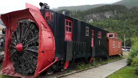 rotary snowplow no.1 on display alongside engine no.52, behind the skagway depot, alaska.