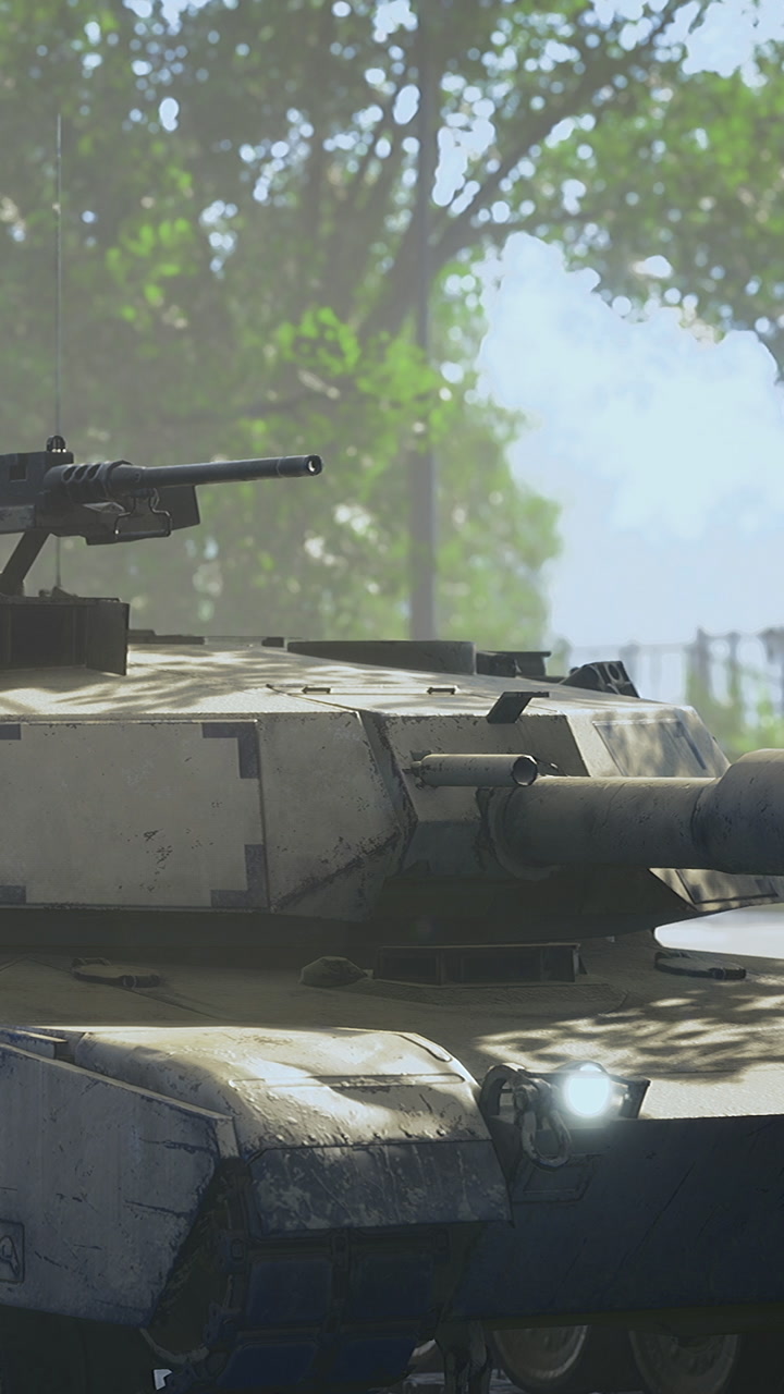 Military tank is positioned in urban area with green trees in background