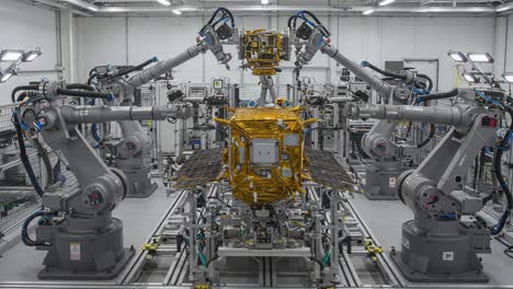 advanced robotics laboratory featuring multiple robotic arms and high-tech equipment for precision engineering and automated tasks in a controlled environment