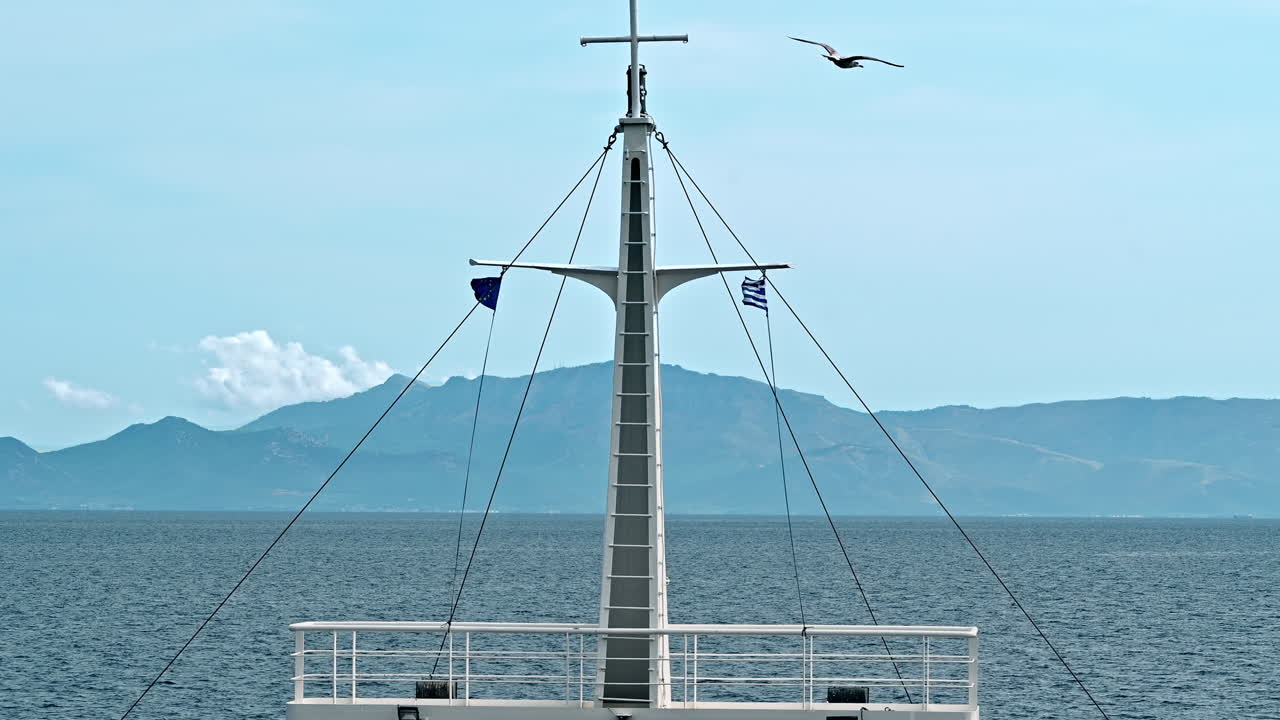 View of the Aegean sea from a ferryboat, Thassos island in the distance, Greece