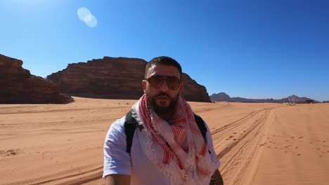 man walking through wadi rum