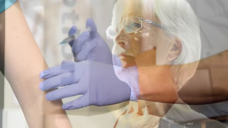 animation of worried senior woman with hands of doctor giving vaccination to patient