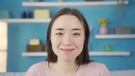 Close-up-portrait-of-cute-and-attractive-young-Asian-woman.