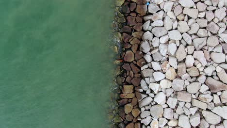 artificial stone breakwater, top down aerial view