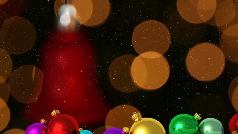 Animation-of-christmas-balls-over-snow-falling-and-bokeh