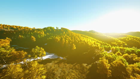 colorful mountains range in autumn season with red orange and golden foliage