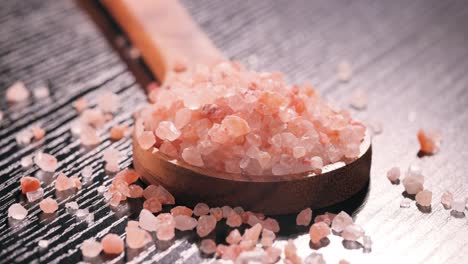 himalayan pink salt in a wooden is used to flavor food. due mainly to marketing costs, pink himalayan salt is up to twenty times more expensive than table or sea salt.